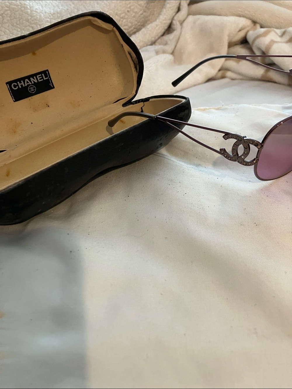 CHANEL Purple Rimless Sunglasses with CC Logo Accent